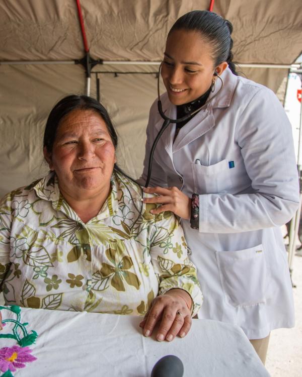 Healthcare worker caring for a woman in Mexico